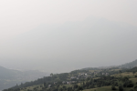 Cielo grigio di polveri sulla piana di Aosta